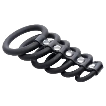 Set of black metal rings with silver centers on a white background