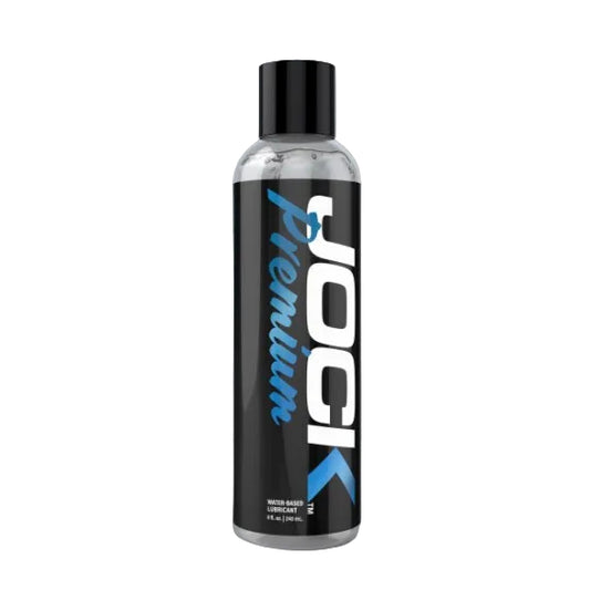 Bottle of JOCK Premium lubricant on a gray background
